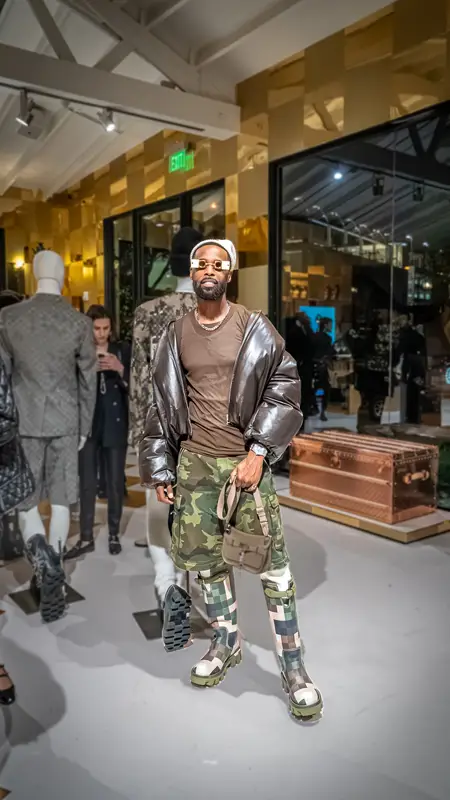 Phillip Davonne Anderson, who happens to be Chris Brown’s stylist, is really stylin’ himself. He’s got on Pharrell Damier Wellington boots! Those glasses are either Google glass – or just simply wild cool
#Davonne-phillip